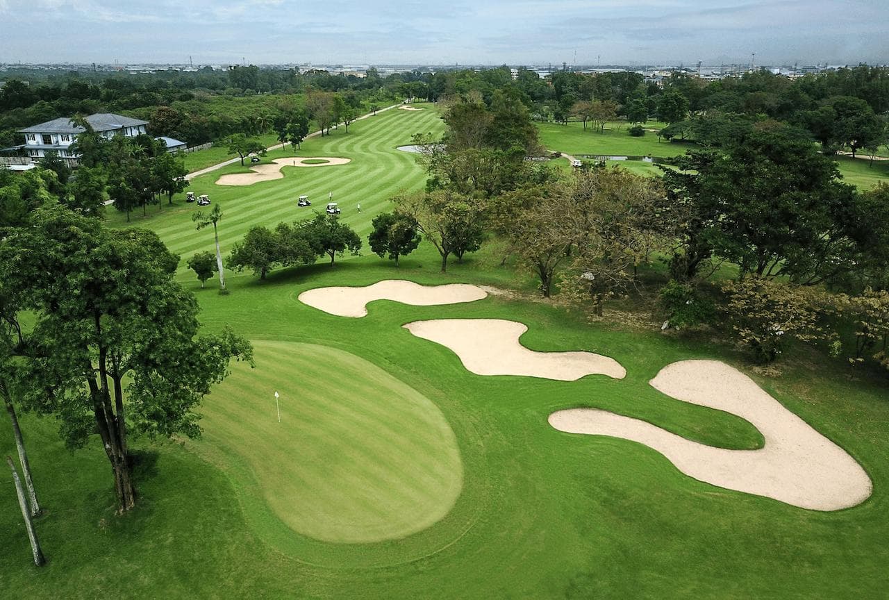 Ekachai Golf and Country Club fairway and green - golf course Thailand